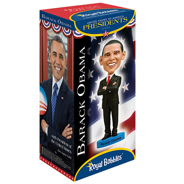 Barack Obama bobblehead box featuring the American flag in the background. The side shows Obama’s color portrait with details of his lifespan and presidency. The tone is patriotic and historical.