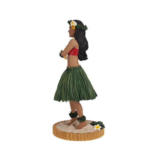 Left side view of the Hula dancer figurine in green grass skirt with floral lei on sandy base