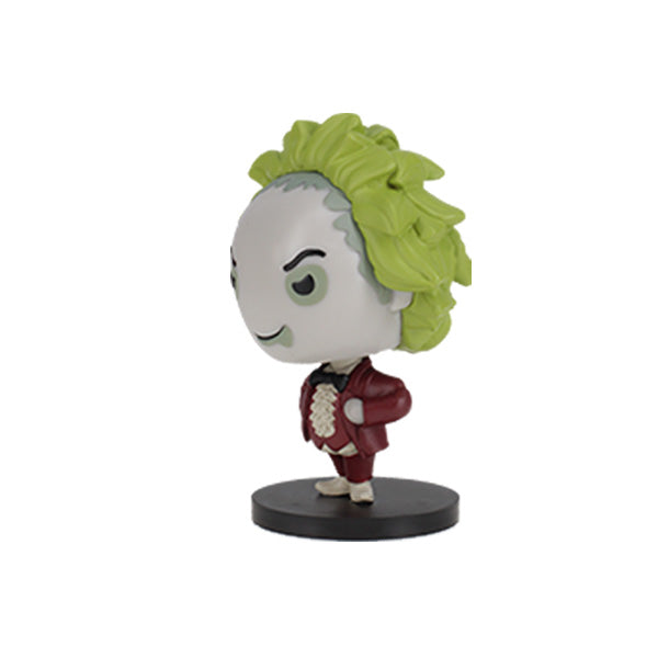 3/4 left side view Beetlejuice Go! Bobbles a mischievous vinyl figure with large green hair and a smirk. It wears a red suit with a white ruffled shirt. The stance is confident and playful.