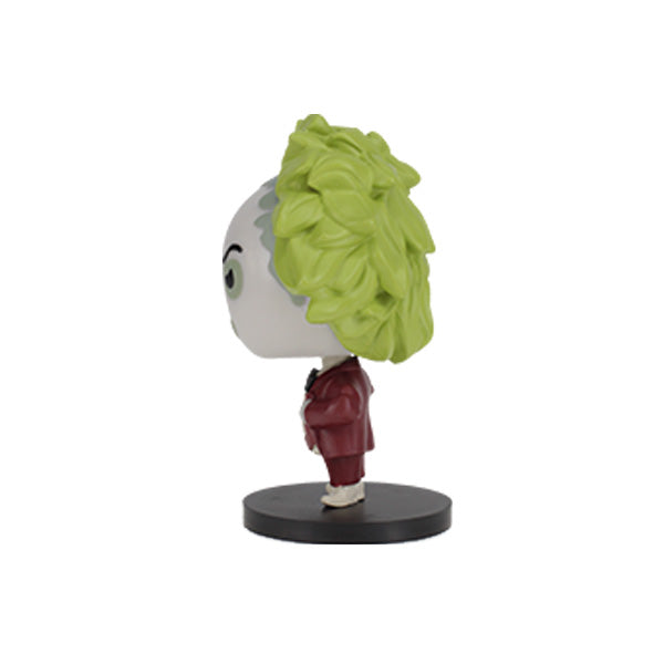 Left side view Beetlejuice Go! Bobbles a mischievous vinyl figure with large green hair and a smirk. It wears a red suit with a white ruffled shirt. The stance is confident and playful.