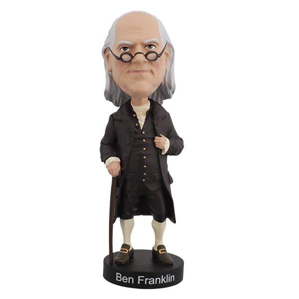 Benjamin Franklin bobblehead featuring an elderly man with a bald head and long white hair, wearing glasses and colonial attire, stands on a base labeled "Ben Franklin."