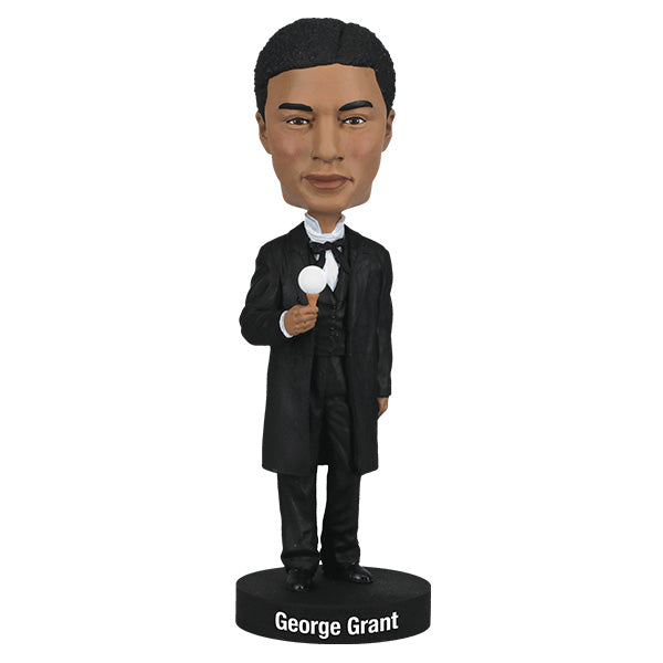 Bobblehead of George Grant in formal attire with a golf tee in hand