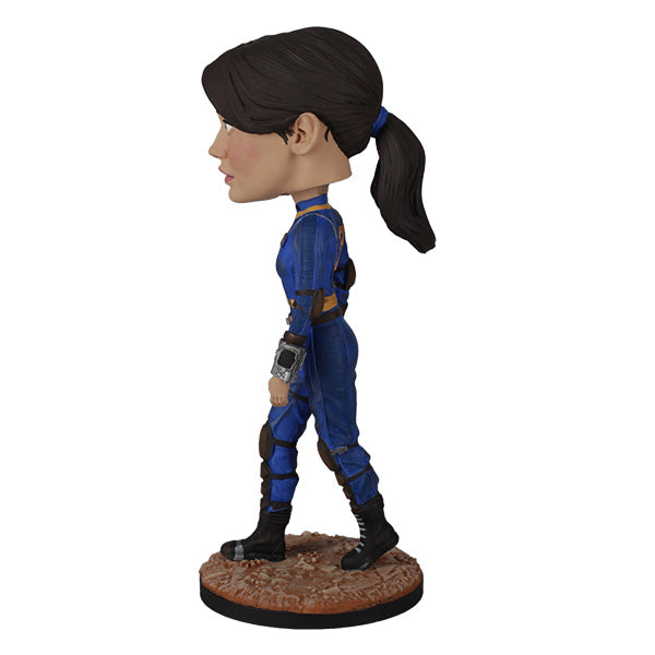Bobblehead figure of a character in a blue outfit on a white background