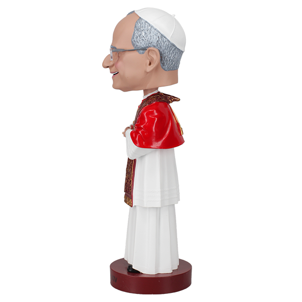 Left side view of a bobblehead of a smiling figure in papal attire with a red cape and ornate gold stole, posed against a plain background, labeled "Pope Leo XIV."