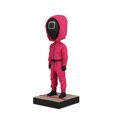 Left view pink hooded suit with a black mask on a white background