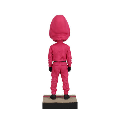 Back view pink hooded suit with a black mask on a white background